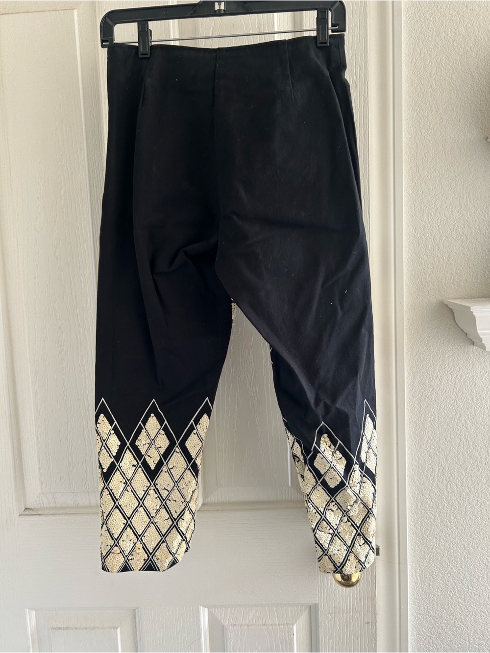 Vanity Black Pants with White Brand Tag